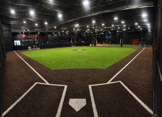 Indoor turf infield inside a multi-sport training complex